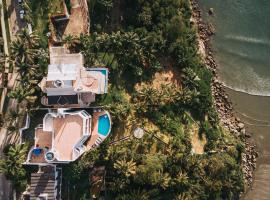 Conforto, Vista linda e Pé na Areia | Barequeçaba, hotel in Barequeçaba