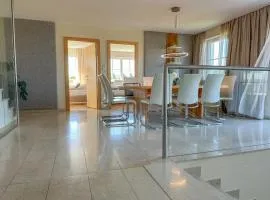 "GLÜCKSMOMENT" - Premium Apartments Seekirchen, beeindruckende Ferienwohnung mit gemeinsam genutzter Poolarea