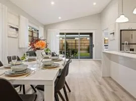 Modern 4BR Home Peaceful Logan Reserve Stay
