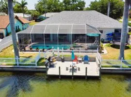 Luxury Waterfront Vacation Home with Dock and free heated Pool