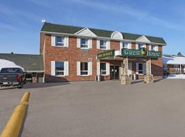 Guest House Inn & Suites, hotel amb aparcament a Edson