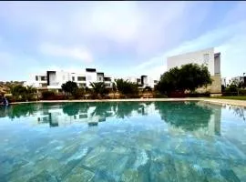 2 minutes de la plage , Résidence Tamourrit, Taghazout Bay , vue mer , golf , piscine