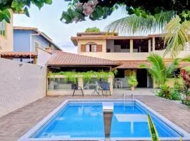 Casa Linear Térrea com Piscina no Atlântico