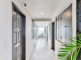Super Townhouse Reva College University, hotel v destinaci Yelahanka
