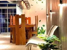4 Bedroom with Garage up to 12 Guests - near Airport walking distance to stores and restaurants