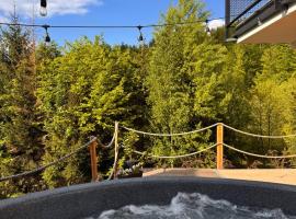 Domki Dwa jelonki - balia z jacuzzi i sauna