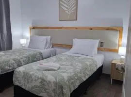 The Village Getaway- 2 Bedroom with luxury comfort and convenience