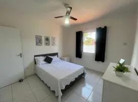 Casa 1 km da Praia Enseada com Garagem