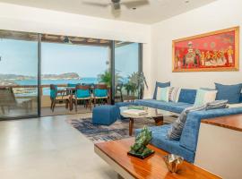 Luxury condo with ocean view & beach access，塔果魯達的分租公寓