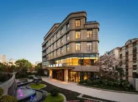 上海虹桥荷逸唐酒店北新泾地铁站Shanghai Hongqiao Heyitang Hotel Beixinjing Subway Station Branch、上海市にある上海虹橋国際空港 - SHAの周辺ホテル