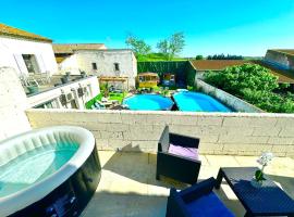 Les Appartements du Mas - EMERAUDE，位于艾格-莫尔特的酒店