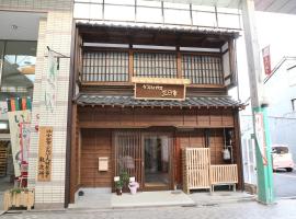 Guesthouse Mikkaichi, hótel í Komatsu
