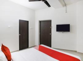 Hotel O Zion Inn, hotel di Vapi