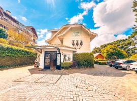 VELINN Pousada Chateau do Luar Prime，位于坎波斯杜若尔当的宾馆