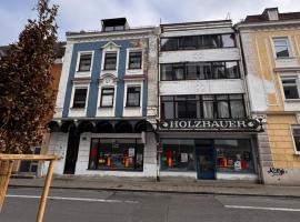 Stadt Apartments Bade, хотел в Розенхайм