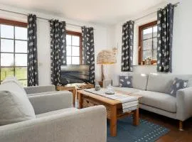 Ferienhaus May App 1