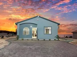 Sunset at ArecaHomes Beach Access Pool and Water Park