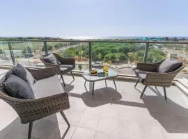 Sunlit Balcony and Coastal Charm by Sea N' Rent