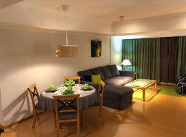 Large family room near Metro Taipei station for comfort and convenience, where 5 can relax and create unforgettable moments, appartement in Taipei