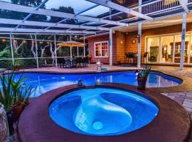 4-bdrm Pool House Paradise 1 block to beach with salt water pool and hot tub