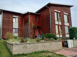 Apartmán v dřevěném domě