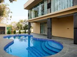 Villa Exotica by StayJade5bhkPoolACProjector
