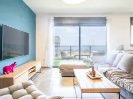 Vibrant Seaside Stay with Balcony by Sea N' Rent