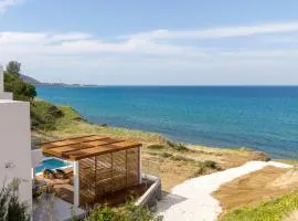 Villa Akroyiali - Seafront Serenity with Shared Pool