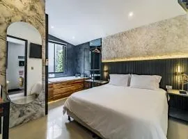 One Apartments Lleras
