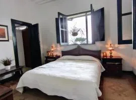 Habitación privada con baño en Finca cafetera