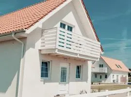 Domki Biały Lotos - Cisza i natura blisko plaży i centrum