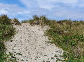 Ferienhaus Norderny direkt am Deich, Fledderweg 8 in Norddeich, ξενοδοχείο σε Norden