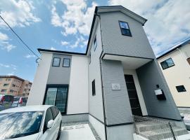 福の荘 空港1号棟, villa in Fukuoka