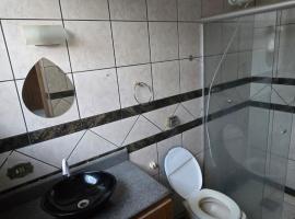 Suíte casal, δωμάτιο σε οικογενειακή κατοικία στο Κάμπο Γκράντε