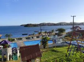 TOP 1 QUARTO com ESTACIONAMENTO em Condomínio com VISTA INCRIVEL - PORTARIA 24h, PISCINA, Sauna e Parquinho Infantil - Apartamento com Ar condicionado, Smart TV, Wi-Fi, Cozinha Completa, apenaaldeia