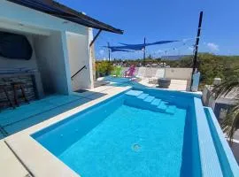 Casa Linda Isla-Room Palmera-Shared Pool