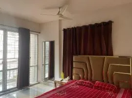 Comfy bedroom with Balcony and attached washroom