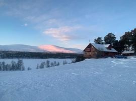 Huset Utsikten p&aring; Langsj&oslash;volden g&aring;rd, hotel com estacionamento em Tolga