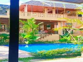 Tridharma Suites