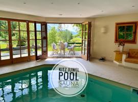 KitzDiamant with Pool, Sauna & Garden Deluxe by Belle-Stay, villa in Sankt Johann in Tirol