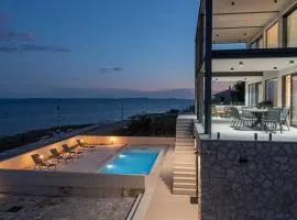 Villa Serena Luxury Seafront Escape with Pool