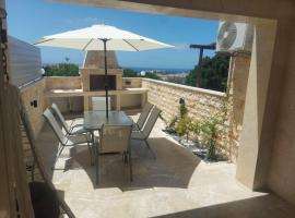 Sea view maisonette Chloraka, hotel v destinaci Klorakas