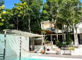 Suítes na Vila Mansinha - perto do quadrado