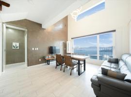 Yeosu Flower Day Ocean View Spa Couple Family Pension: Yeosu şehrinde bir otel