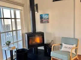 Coastal Sanctuary, Pet Firendly with Fireplace, wood provided Just 50m to Kilcunda Beach and 100m to the Ocean View Hotel The Sticks and Copper Door Kitchen Accessibility Friendly