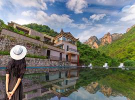 Avatar Peaks Resort - English Service - Complimentary Shuttle to Forest Park Ticket Gate, φθηνό ξενοδοχείο σε Zhangjiajie