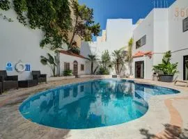 Bungalow home with Stunning Pool Area in St'Julians By 360 Estates