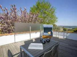 Ferienwohnung - Rügenbrise mit Seeblick mit 3 Bädern, Steg und Paddelboot - alle inklusive