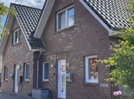 Feriendomizil Dornum Haus Willy mit Wintergarten und Wallbox