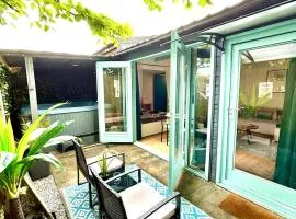 Caribbean style beach house with jacuzzi & private garden near Amsterdam